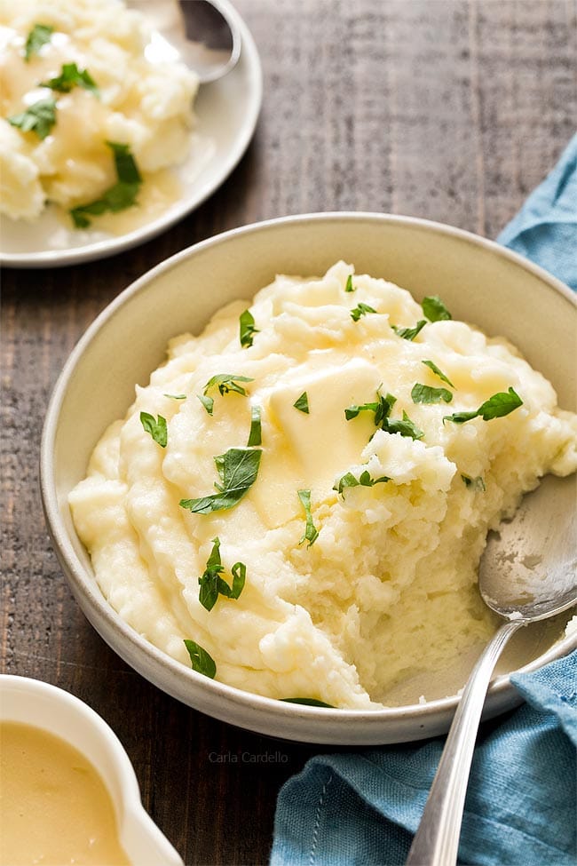 Mashed potatoes in a bowl with a spoon