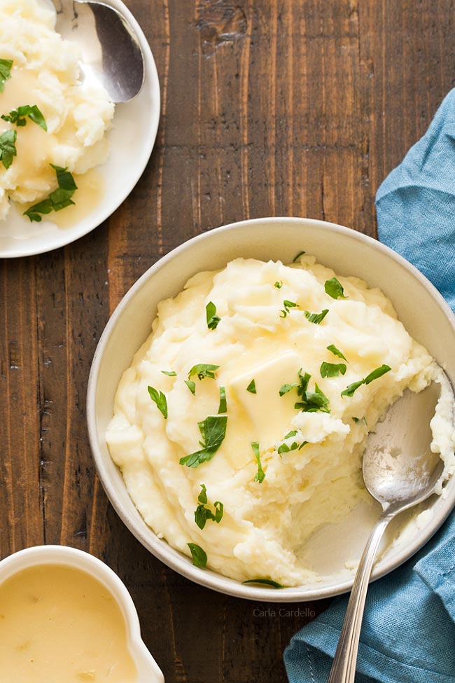 Overhead shot of mashed potatoes in bowl with spoon