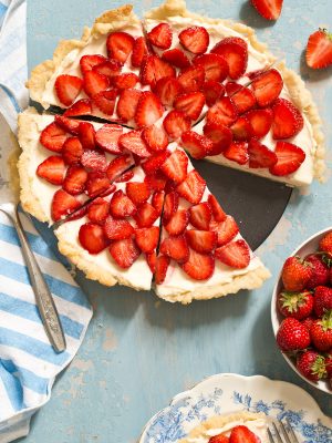 Strawberry Cream Cheese Tart with a homemade pie crust is an easy summer tart that will impress. It's like eating a strawberry pie and cheesecake in one bite.