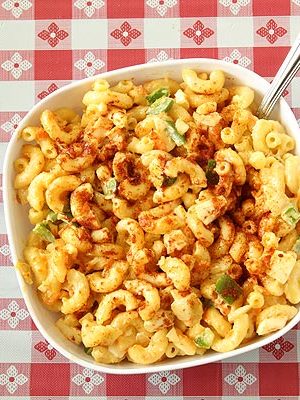 Amish Macaroni Salad is a twist on the classic macaroni salad with mustard, paprika, and a little bit of sugar.