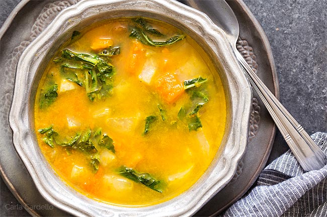 Close up of Kohlrabi Soup in silver ridged bowl