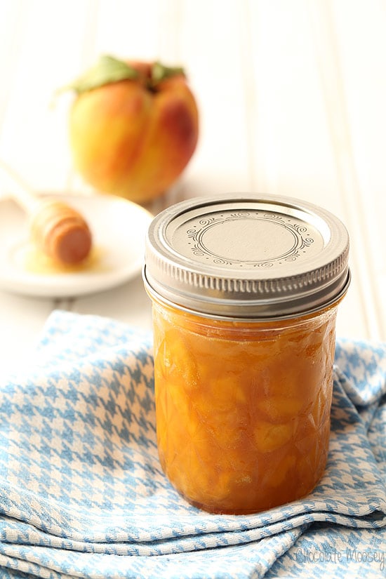 Peach Jam without pectin in a jar on a linen