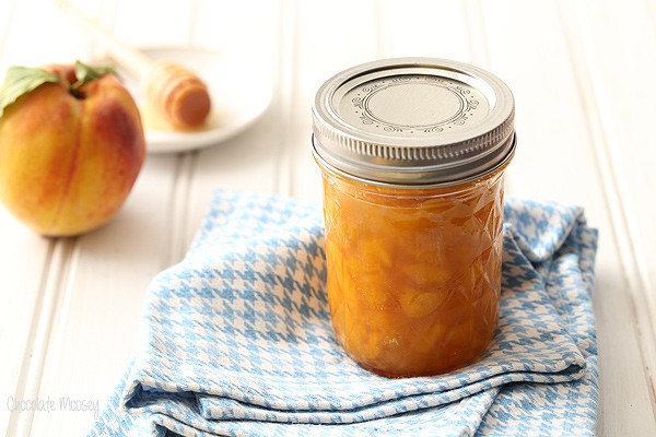 Peach Jam without pectin in a jar on a linen