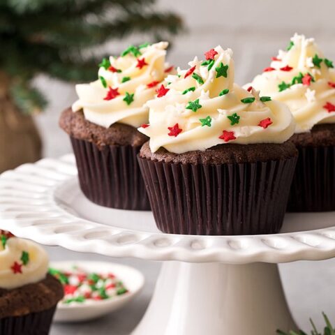 Gingerbread cupcakes on white cake stand