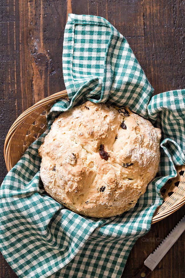 Small Soda Bread in bread basket with green linen