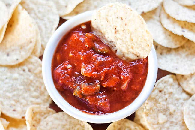 White bowl with red salsa