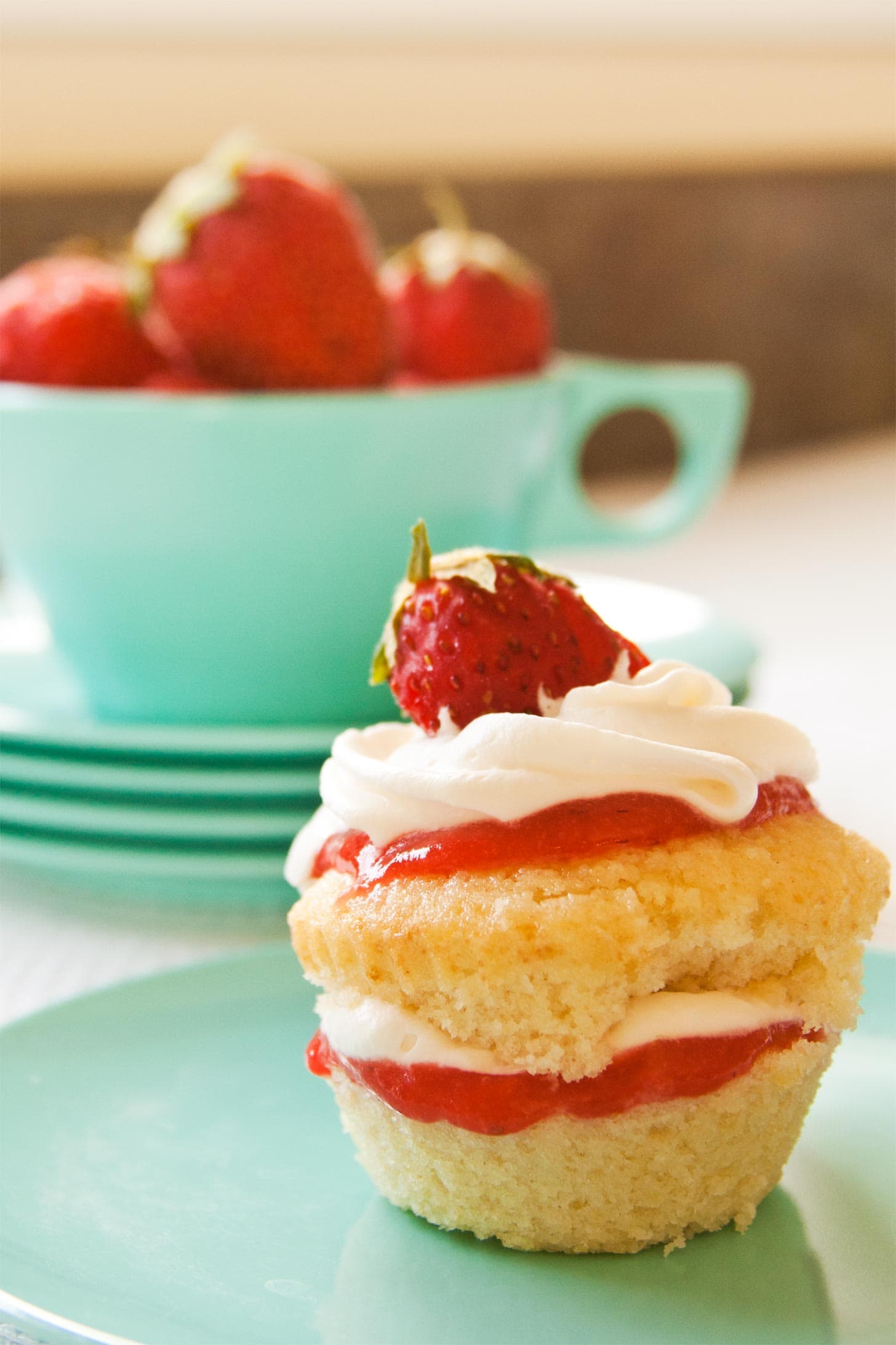 Shortcake cupcakes with strawberry on plate