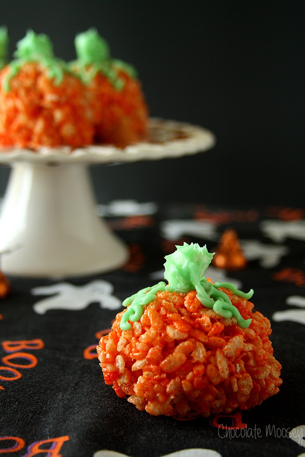 Rice Krispie Pumpkins on black Halloween fabric