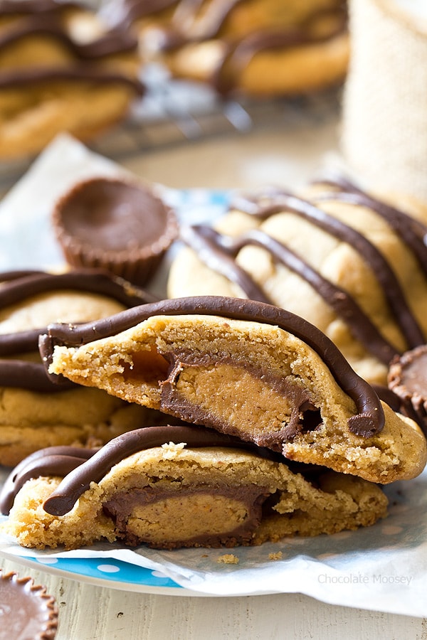 What's better than a single peanut butter cookie? Double Peanut Butter Surprise Cookies stuffed with a peanut butter cup and drizzled with chocolate on top.