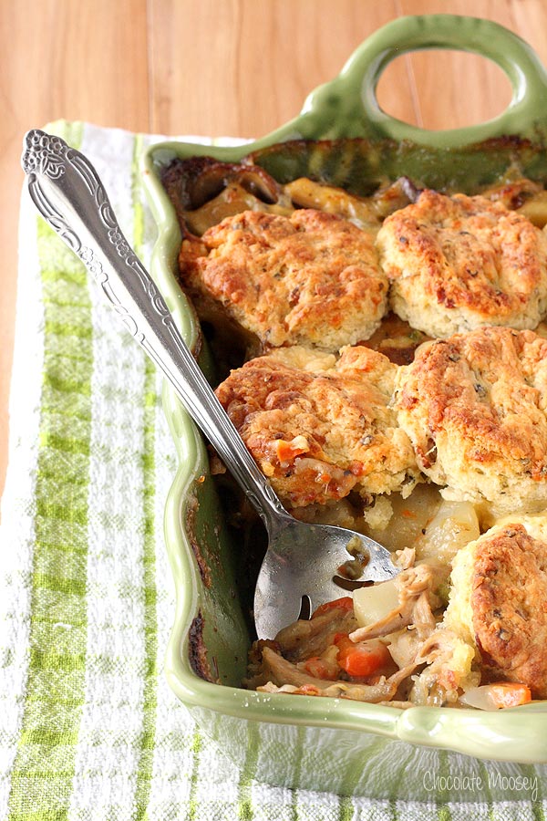 Chicken Pot Pie Casserole topped with homemade bacon cheddar biscuits