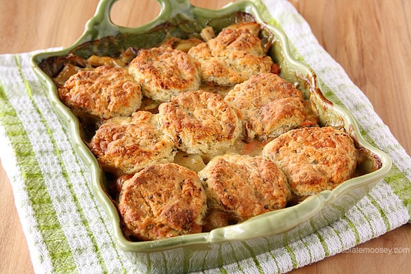 Chicken Pot Pie Casserole topped with homemade bacon cheddar biscuits