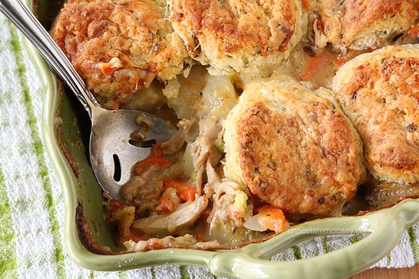 Chicken Pot Pie Casserole topped with homemade bacon cheddar biscuits