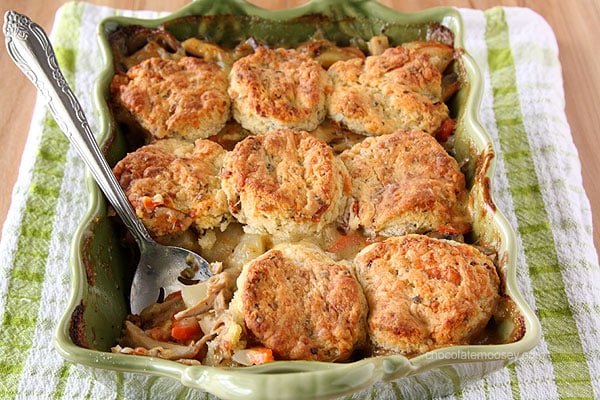 Chicken Pot Pie Casserole topped with homemade bacon cheddar biscuits