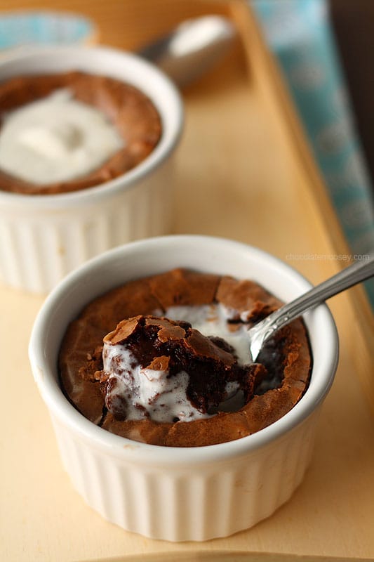 Brownie in white ramekin with spoon in middle