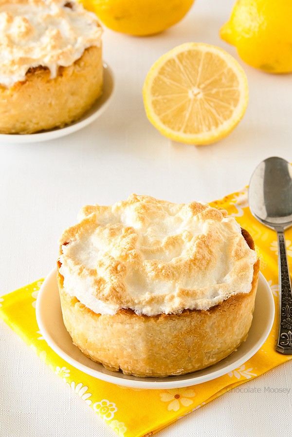 Whole mini lemon meringue pie on plate