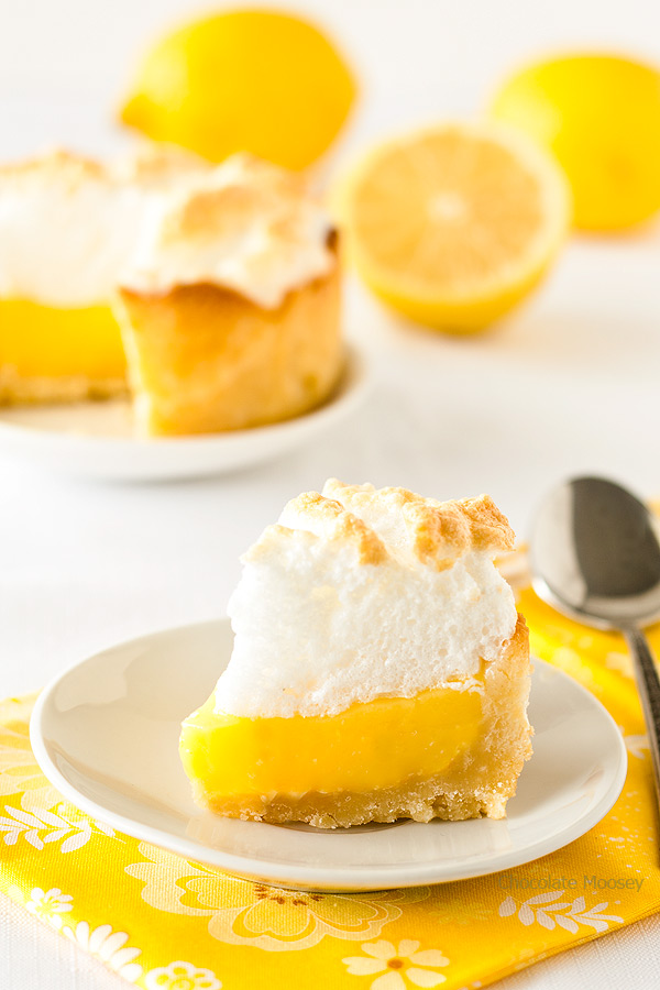 Slice of mini lemon meringue pie on plate