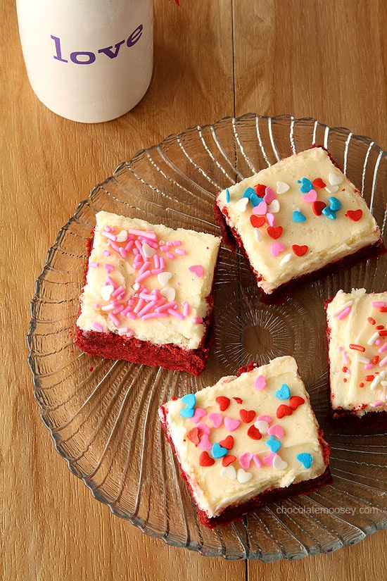 If you love red velvet cake, then you'll love these homemade Small Batch Red Velvet Sugar Cookie Bars from scratch without cake mix, complete with a small batch of cream cheese frosting and sprinkles.