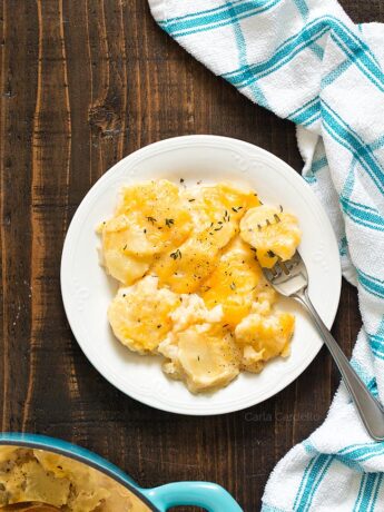 scalloped potatoes on white plate