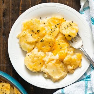 scalloped potatoes on white plate