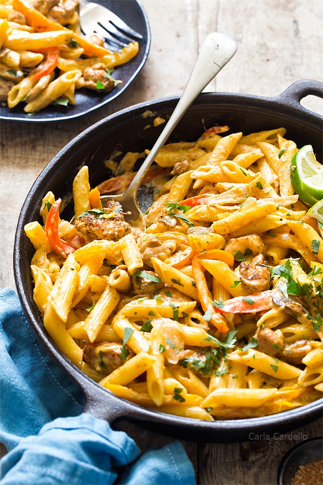 Chicken Fajita Pasta in skillet with spoon