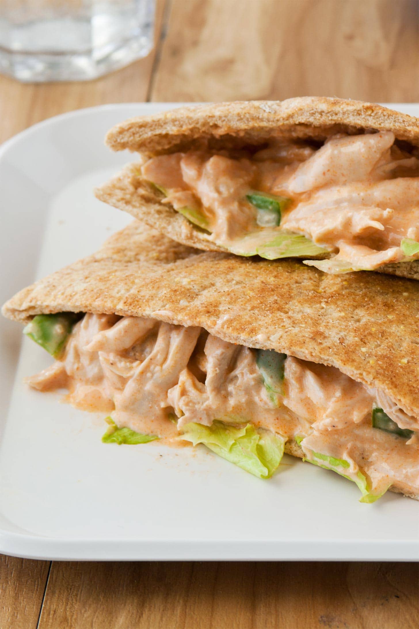 Buffalo chicken salad sandwiches on white plate