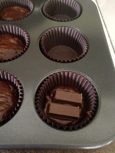 Filling Kit Kat Cupcakes | www.chocolatemoosey.com