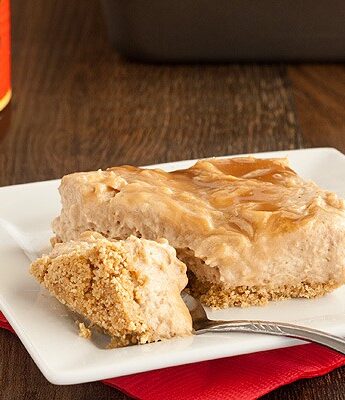 Take a bite of fall with creamy No Bake Caramel Swirl Apple Butter Cheesecake with a homemade graham cracker crust.