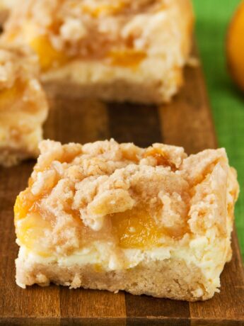 Peach Crumb Bars with cheesecake layer