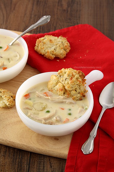 Craving chicken pot pie but don't have time to make it? This Chicken Pot Pie Soup For Two recipe with cheddar biscuits has all of your favorite ingredients in one bite without having to make a pie crust. Ideal comfort food as the weather gets colder!