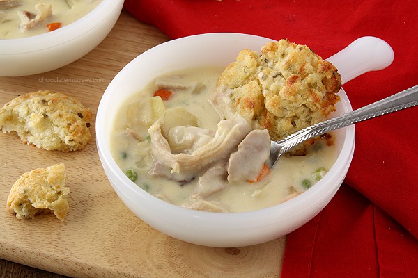 Craving chicken pot pie but don't have time to make it? This Chicken Pot Pie Soup For Two recipe with cheddar biscuits has all of your favorite ingredients in one bite without having to make a pie crust. 