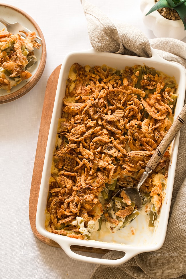 White casserole dish filled with green bean casserole