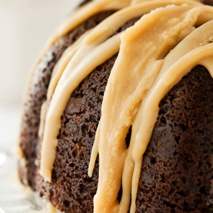 Close up of caramel glaze on chocolate bundt cake