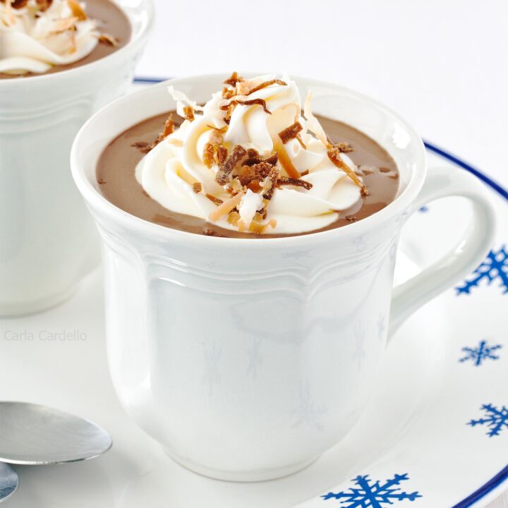 White mug with coconut milk hot chocolate
