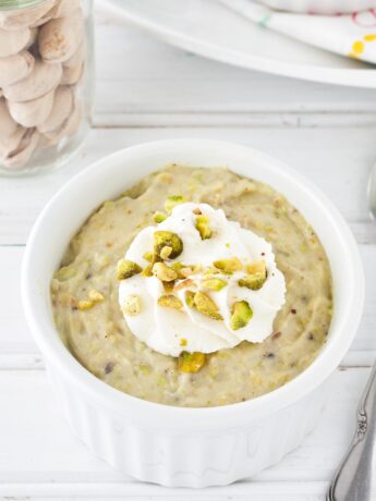 Homemade pistachio pudding in white ramekin