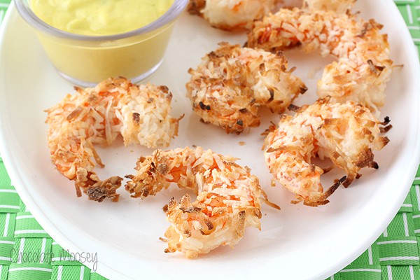 Healthy coconut shrimp on white plate