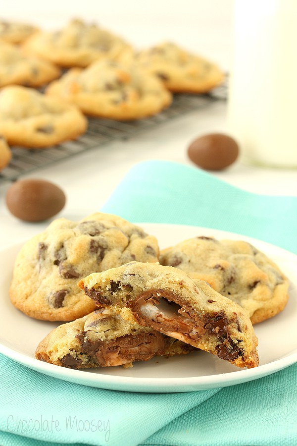 Cadbury Egg Cookies cut in half on a plate