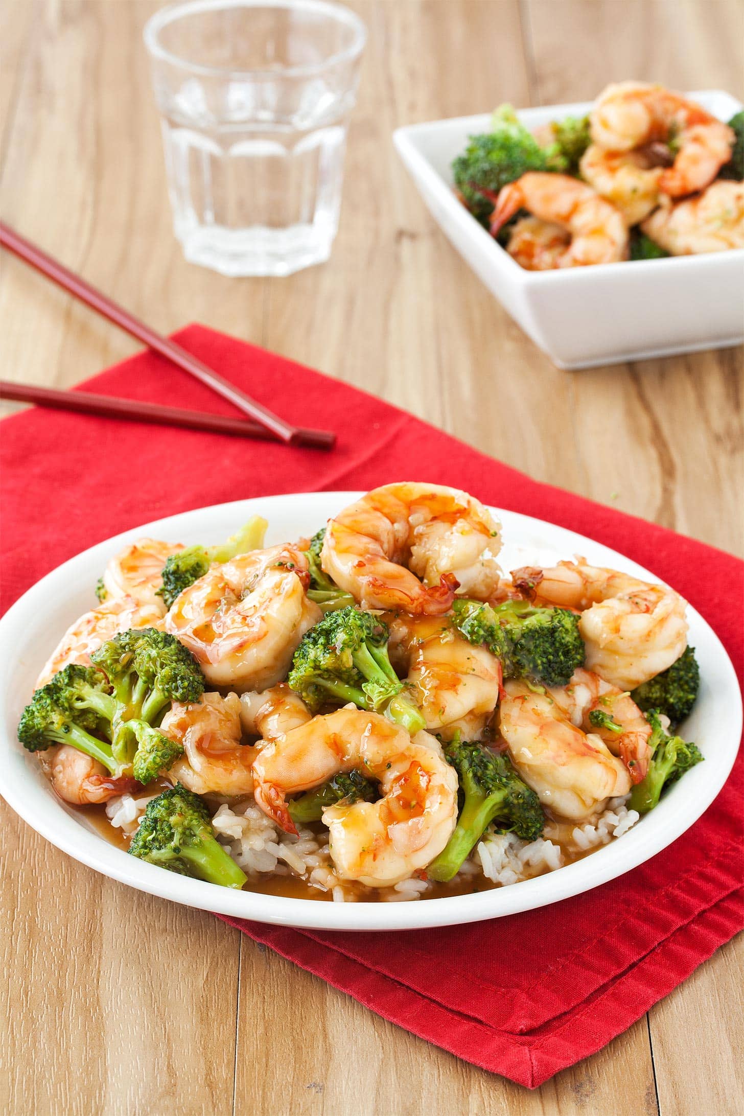 Sweet Chili Shrimp with broccoli and rice on white plate