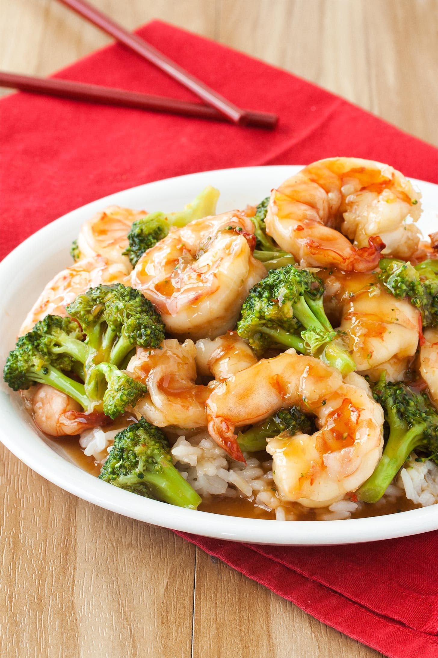 Plate of general tso shrimp with broccoli and rice