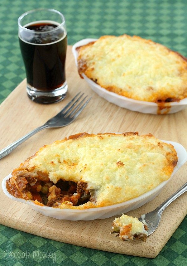 Two mini shepherd's pies with forks