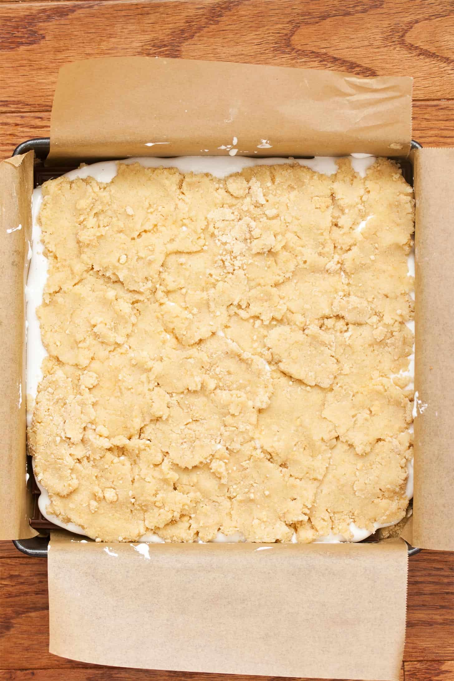 Adding top layer to smores bars