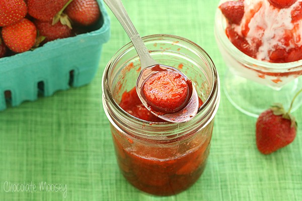 Strawberry Sauce in a jar with a spoon