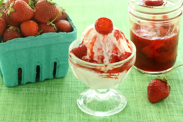 Strawberry sauce poured over ice cream