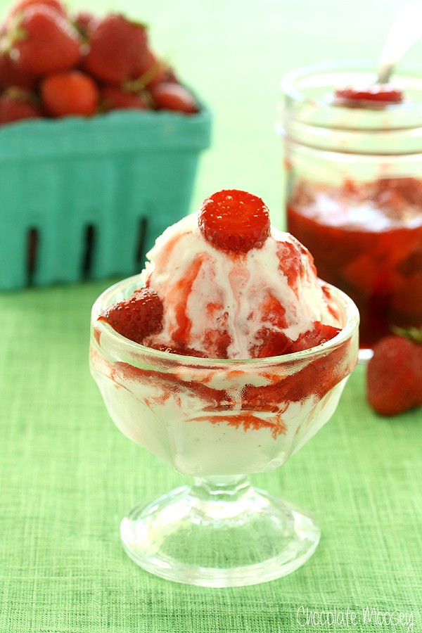 Strawberry sauce poured over ice cream