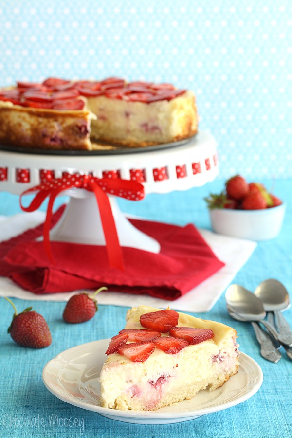 Strawberry Shortcake Cheesecake with fresh strawberries and sponge cake crust