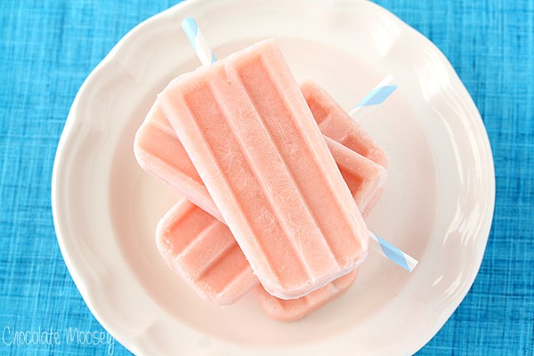 Watermelon Popsicles with Greek yogurt stacked on plate
