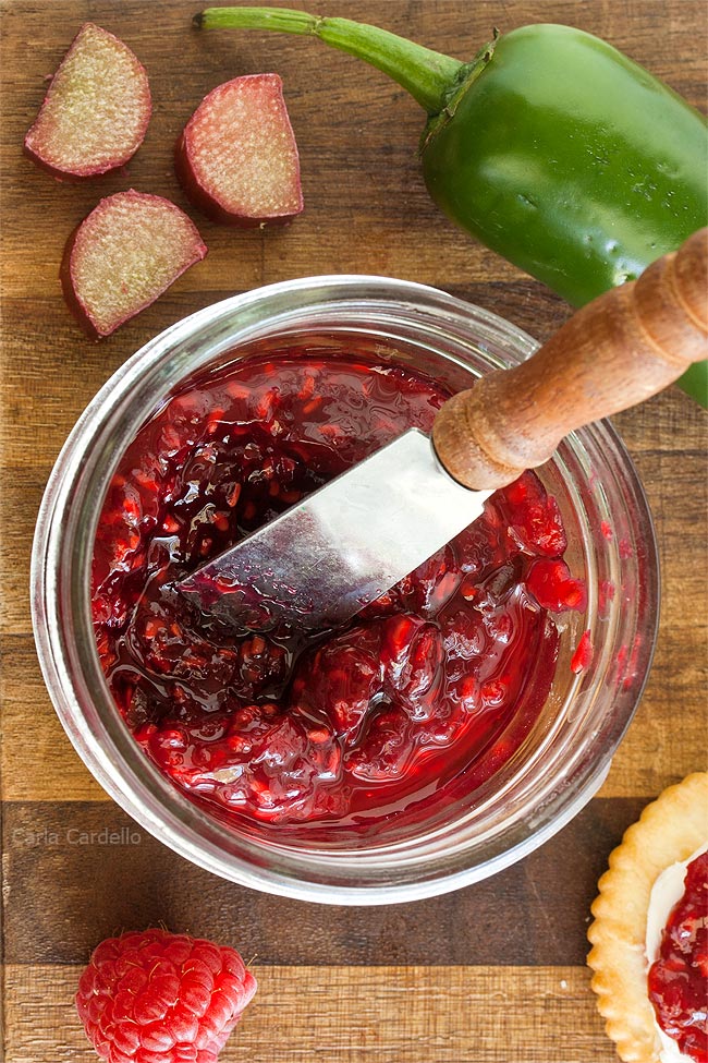 Jar of raspberry jalapeno jam with knife