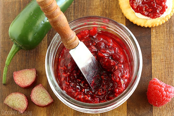 Raspberry Jalapeno Jam in a jar with a knife