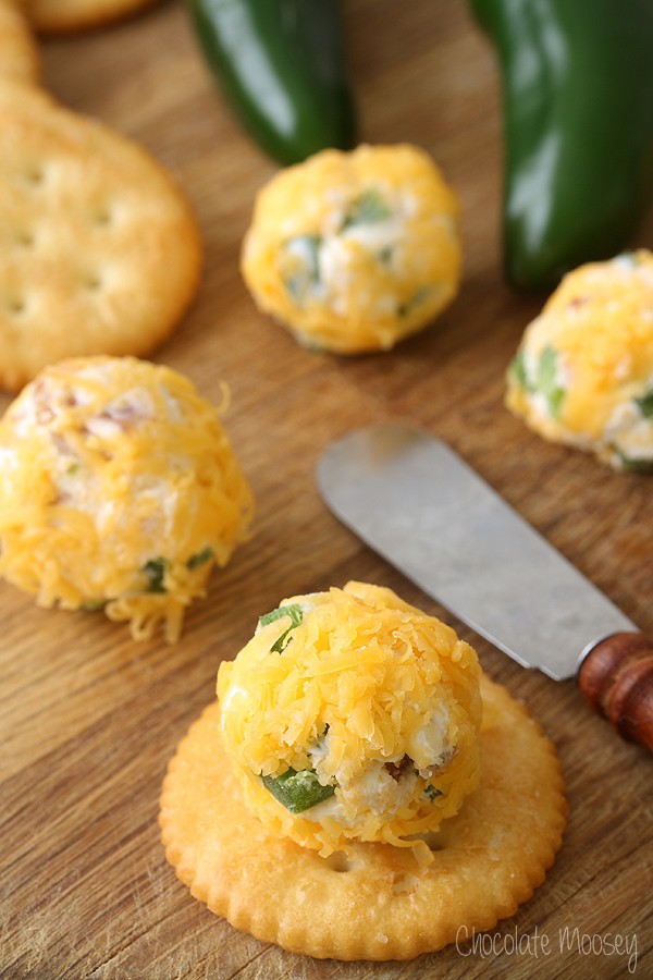 Close up of Jalapeno Popper Cheese Ball Bite on cracker