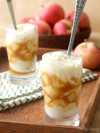 Caramel Apple Cheesecake with a spoon in a parfait glass