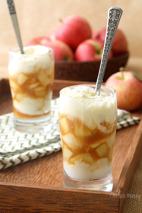 Caramel Apple Cheesecake with a spoon in a parfait glass